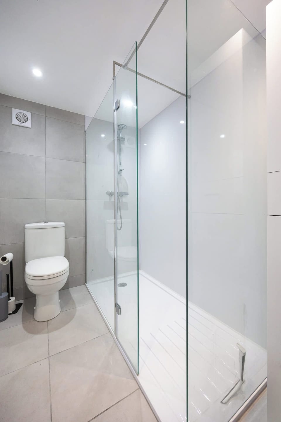 Modern shower room with a large walk-in shower. Bright, stylish and practical, with a fresh, uncluttered finish designed for easy, everyday use.