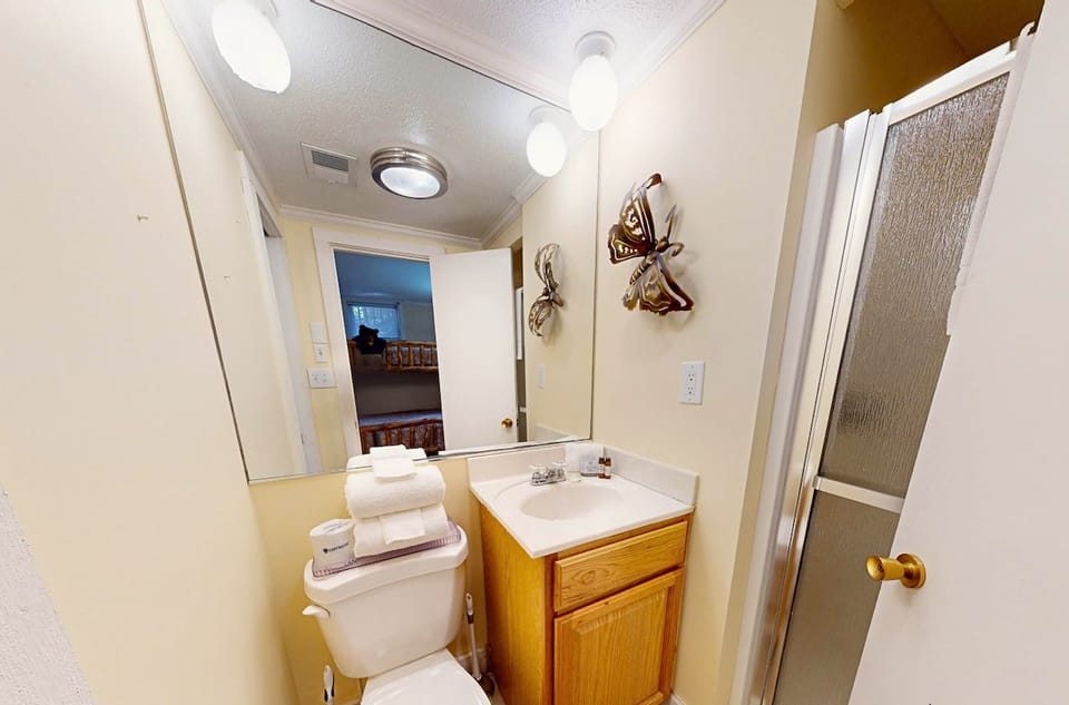 Your private bathroom features a vanity, toilet, and shower—everything you need to refresh after a day of adventure.