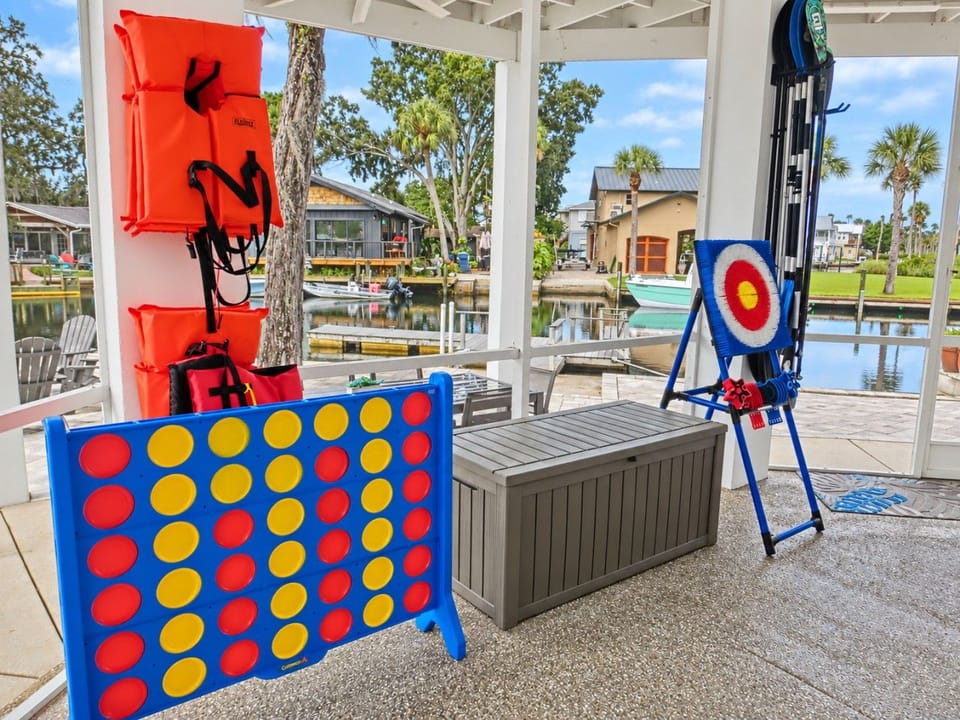 Challenge your crew to giant Connect Four or a target game in the screened patio, with river views as your backdrop.