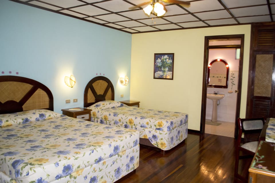 Double Room | Bathroom | Shower, free toiletries, towels