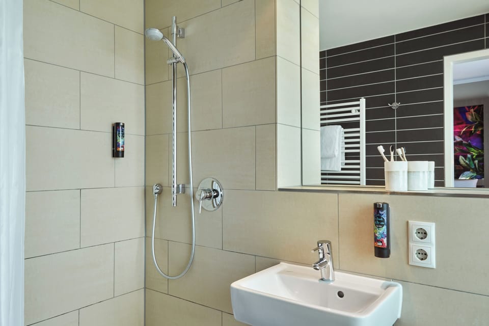 Shower, free toiletries, hair dryer, towels