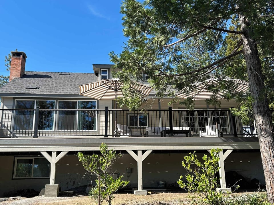Back of the home with multi-level decks