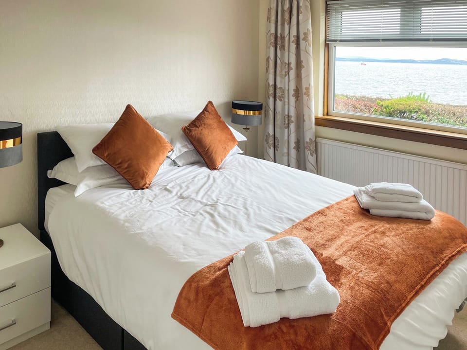 Ground floor bedroom, King Size bed with sea view | Arran View, Wemyss Bay