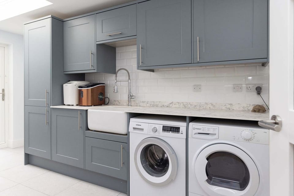 Practical touches for effortless longer stays in the fully equipped utility