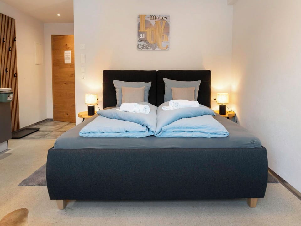 Flooring, Bedroom, Bedding, Bed, Bed Frame, Linens, Bed Sheet, Hardwood, Mattress, Wood Flooring