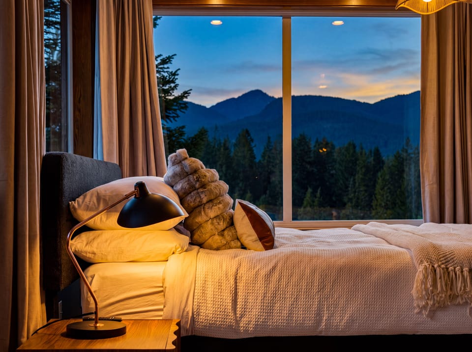 Elkai Lodge | Wake up to sweeping mountain views from your king-size bed. Slow mornings start here.