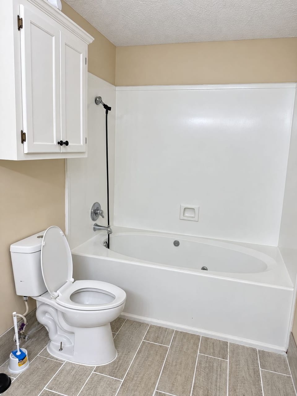 Second full bath with a tub and shower
