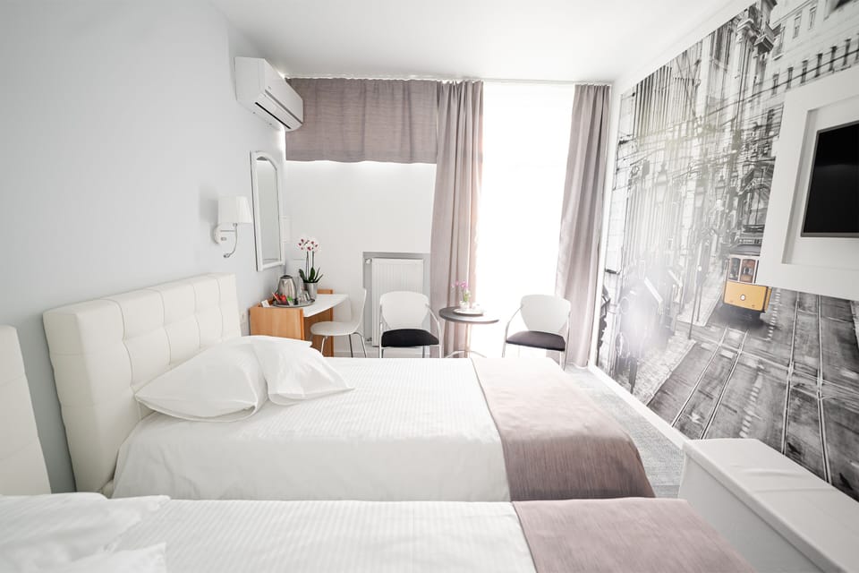 Superior Twin Room | 1 bedroom, in-room safe, desk, iron/ironing board