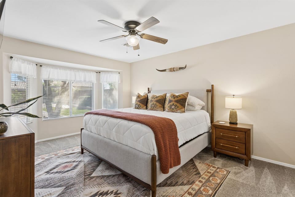 A king bed and a large window for a bright, restful retreat.
