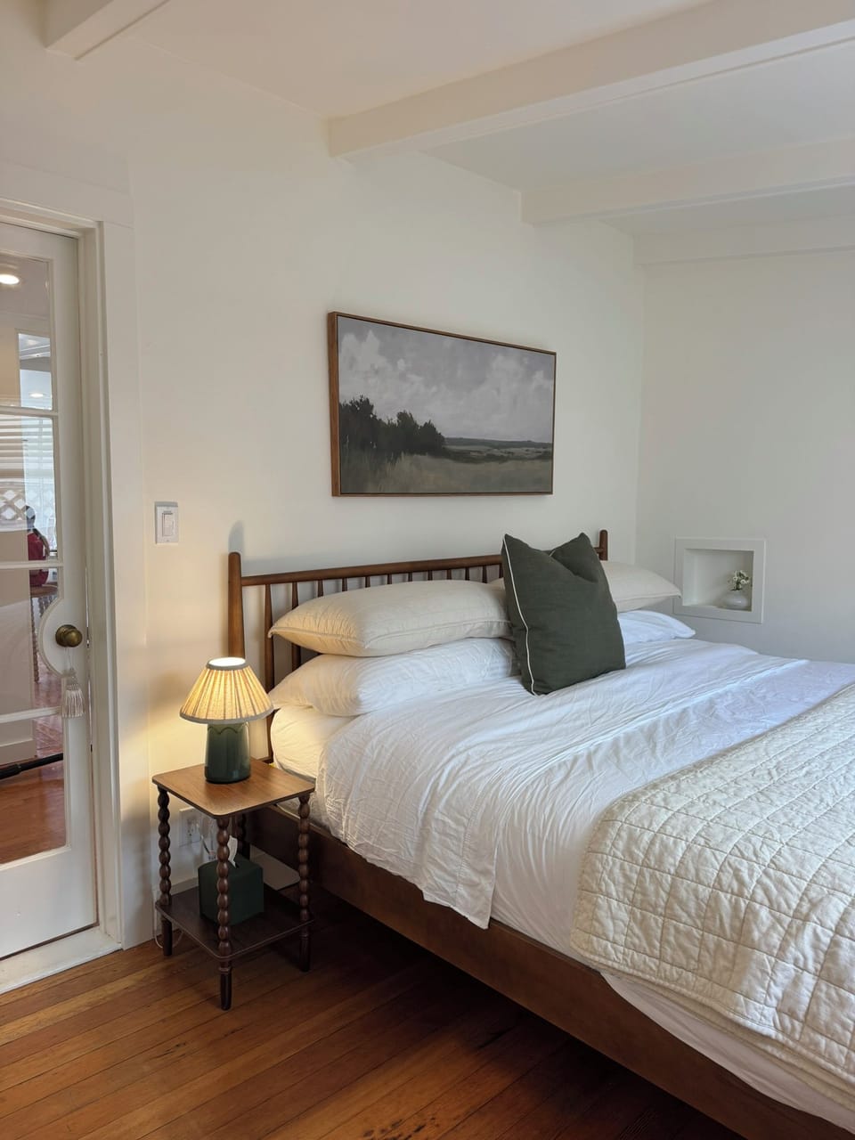 Cozy sanctuary with premium mattress and bedding. Pillow options provided.