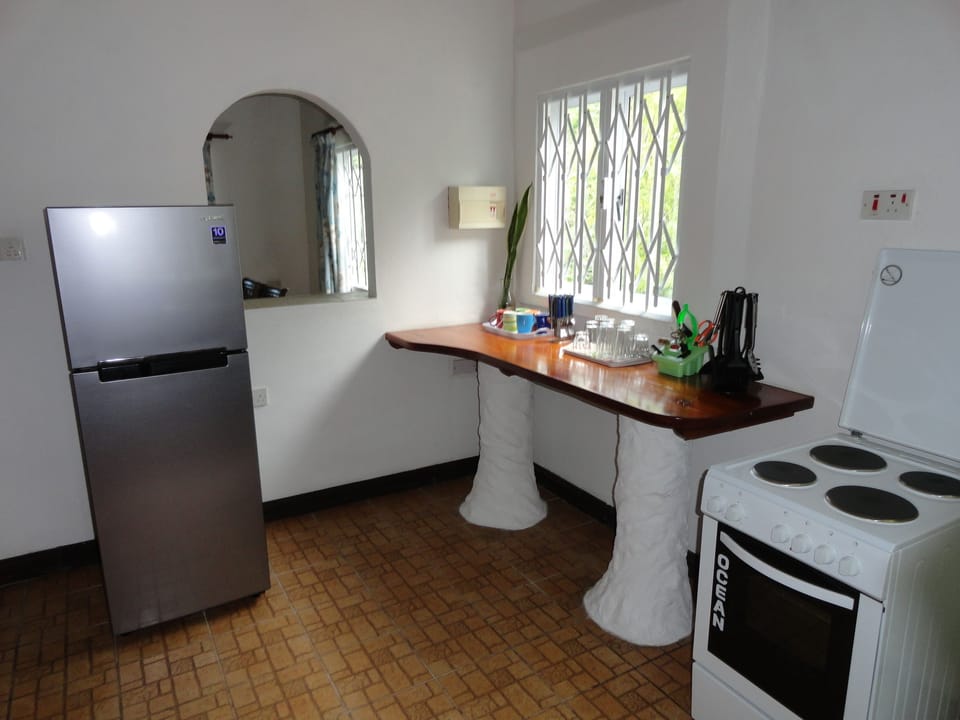 Grand Villa, 2 Bedrooms, Beach View | Private kitchen | Fridge, electric kettle