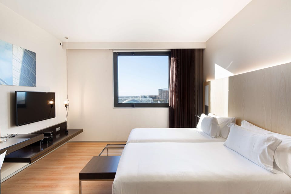 Egyptian cotton sheets, premium bedding, minibar, in-room safe