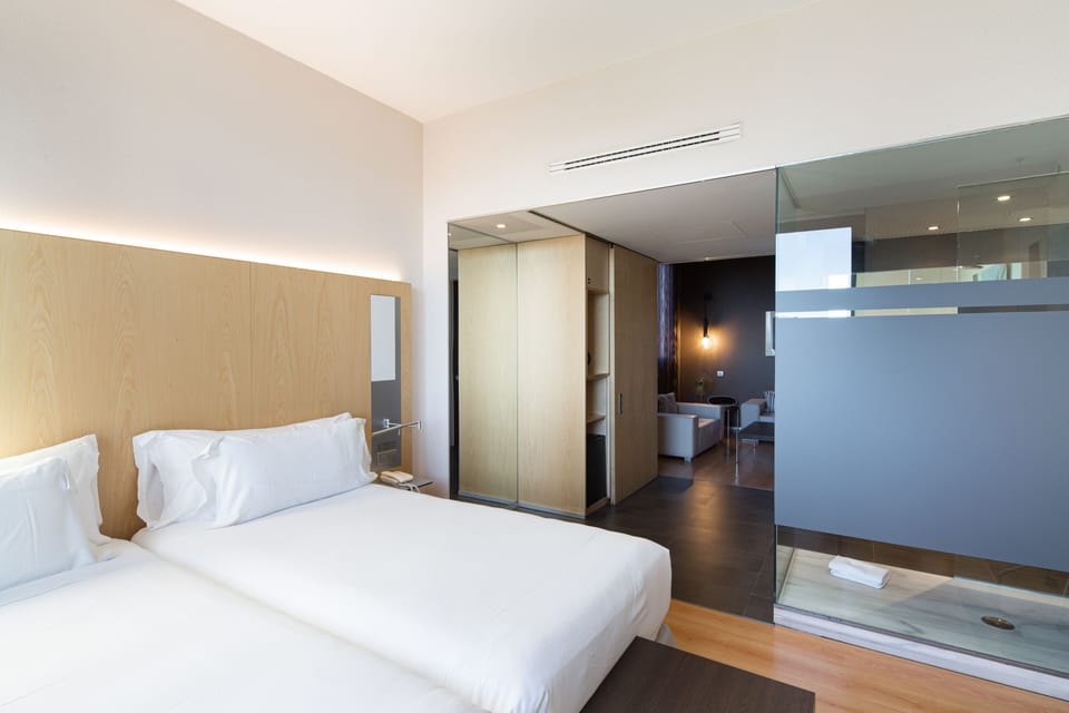 Egyptian cotton sheets, premium bedding, minibar, in-room safe