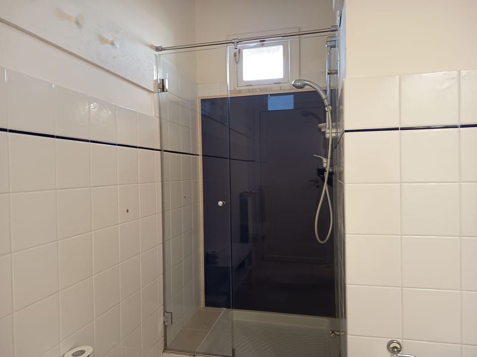 Comfort Quadruple Room | Bathroom | Shower, hair dryer, soap, shampoo