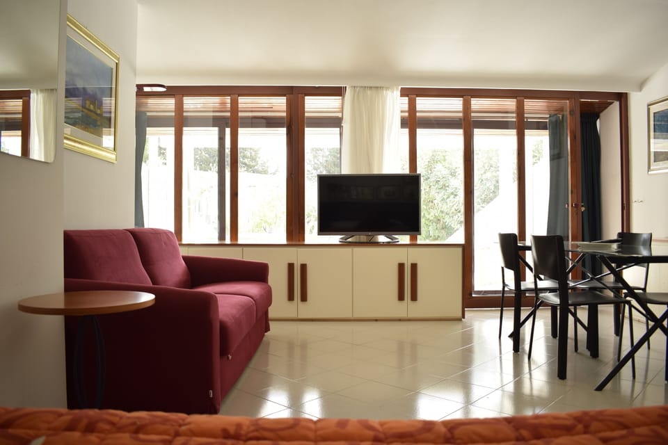 Superior Suite, 1 Bedroom, Garden View, Poolside | Living area | Flat-screen TV, table tennis
