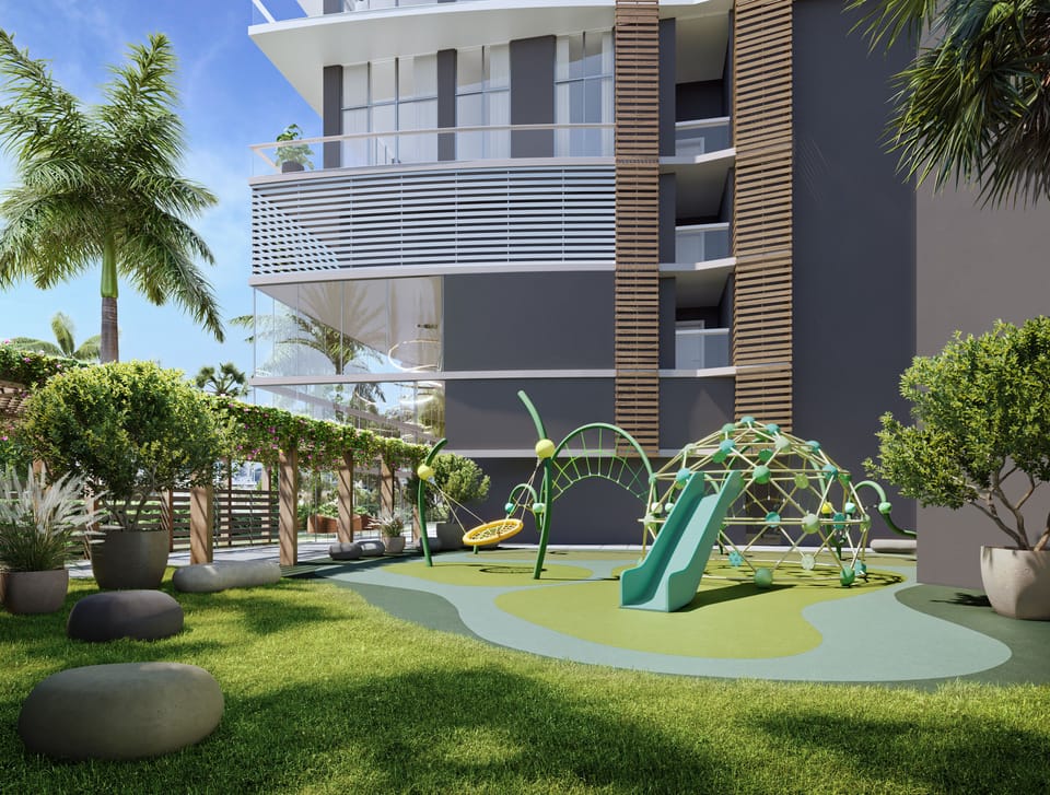 Families can enjoy the outdoor playground with climbing features, a slide, and swings.