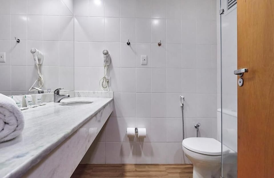 Shower, eco-friendly toiletries, hair dryer, towels