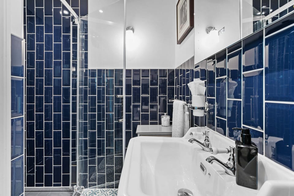 Superior Double Room | Bathroom | Designer toiletries, hair dryer, bathrobes, slippers