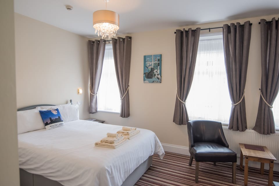 Double Room, 1 King Bed | Blackout drapes, iron/ironing board (on request), WiFi (free)