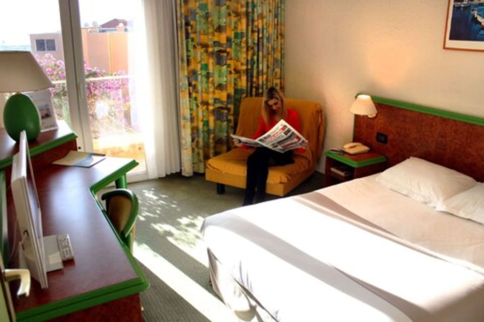 In-room safe, desk, laptop workspace, blackout drapes