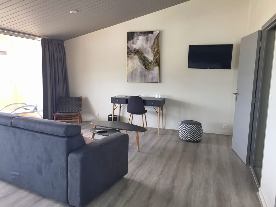 Family Suite, Sea View | In-room safe, desk, soundproofing, iron/ironing board