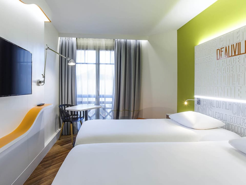 Standard Room, 2 Twin Beds | In-room safe, desk, laptop workspace, blackout drapes