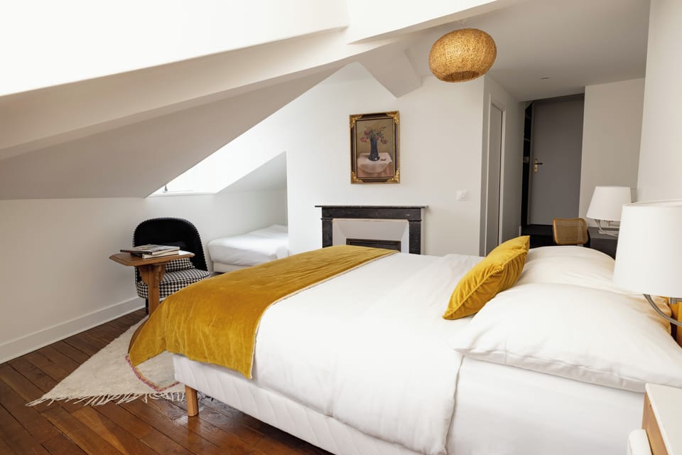 Triple Room | Blackout drapes, iron/ironing board, free WiFi, bed sheets