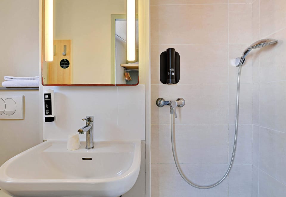 Shower, free toiletries, hair dryer, towels