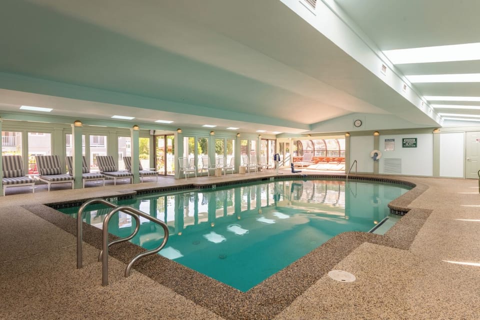 Indoor pool, seasonal outdoor pool, pool umbrellas, sun loungers