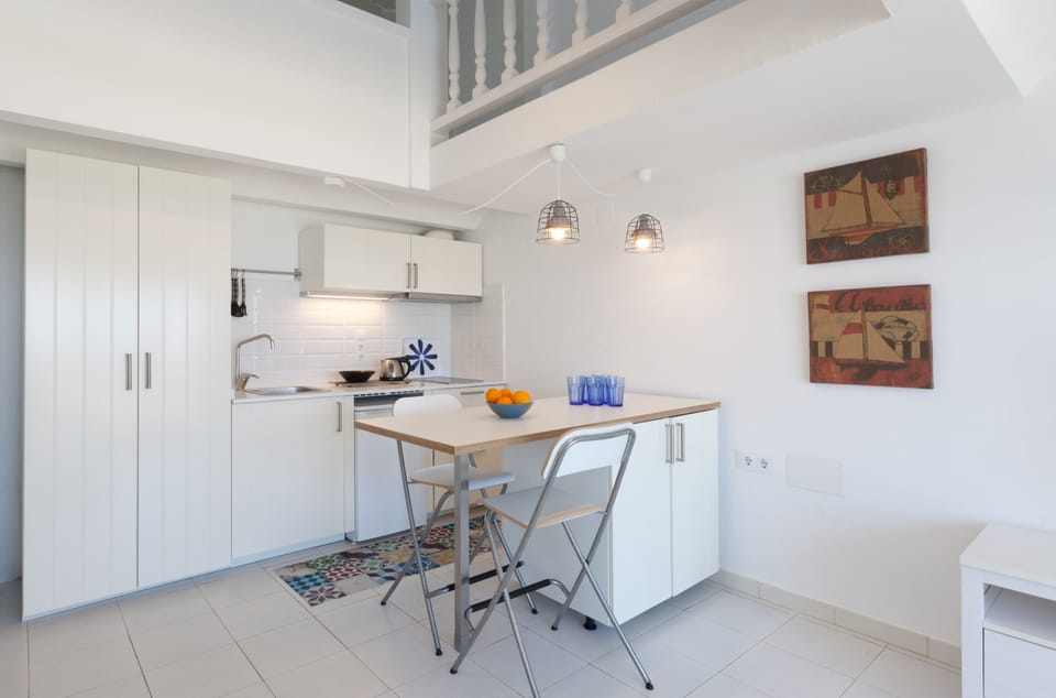 Apartment, Terrace, Garden View | Private kitchenette | Electric kettle, toaster, dining tables