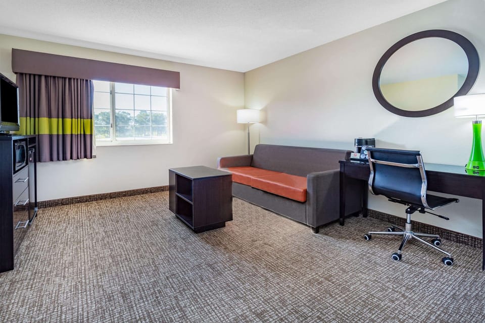 Suite, 2 Queen Beds, Non Smoking | Desk, blackout drapes, iron/ironing board, free WiFi