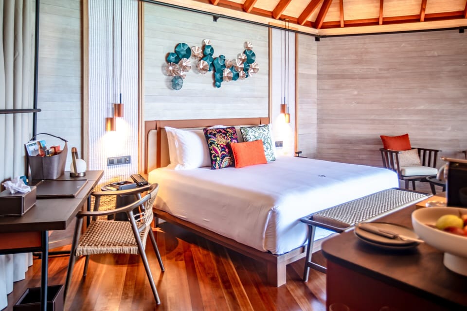 Premium bedding, down comforters, minibar, in-room safe
