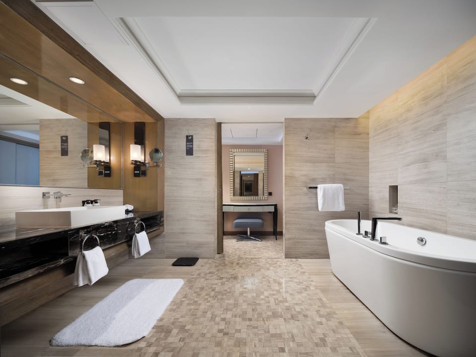 Family Suite, 1 King Bed with Sofa bed | Bathroom | Eco-friendly toiletries, hair dryer, slippers, towels