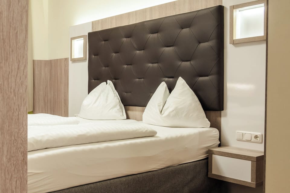Hypo-allergenic bedding, minibar, in-room safe, desk