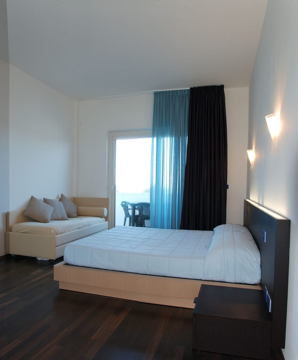 Apartment, 1 Bedroom | In-room safe, soundproofing, iron/ironing board, cribs/infant beds