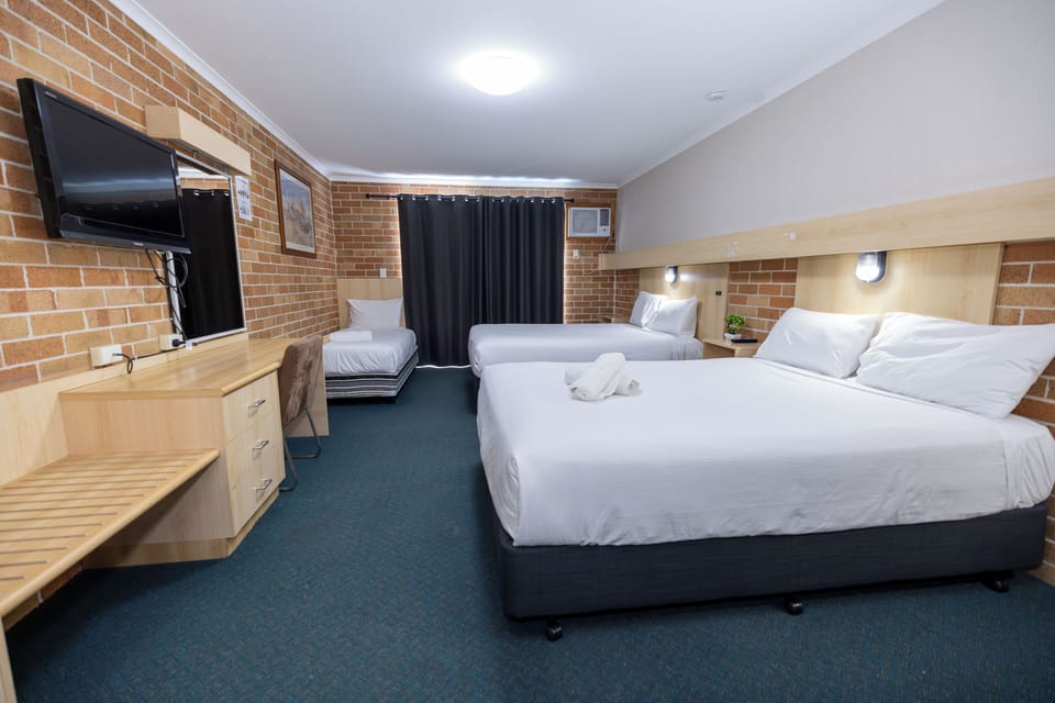 Family Room | Desk, WiFi (free), alarm clocks, bed sheets