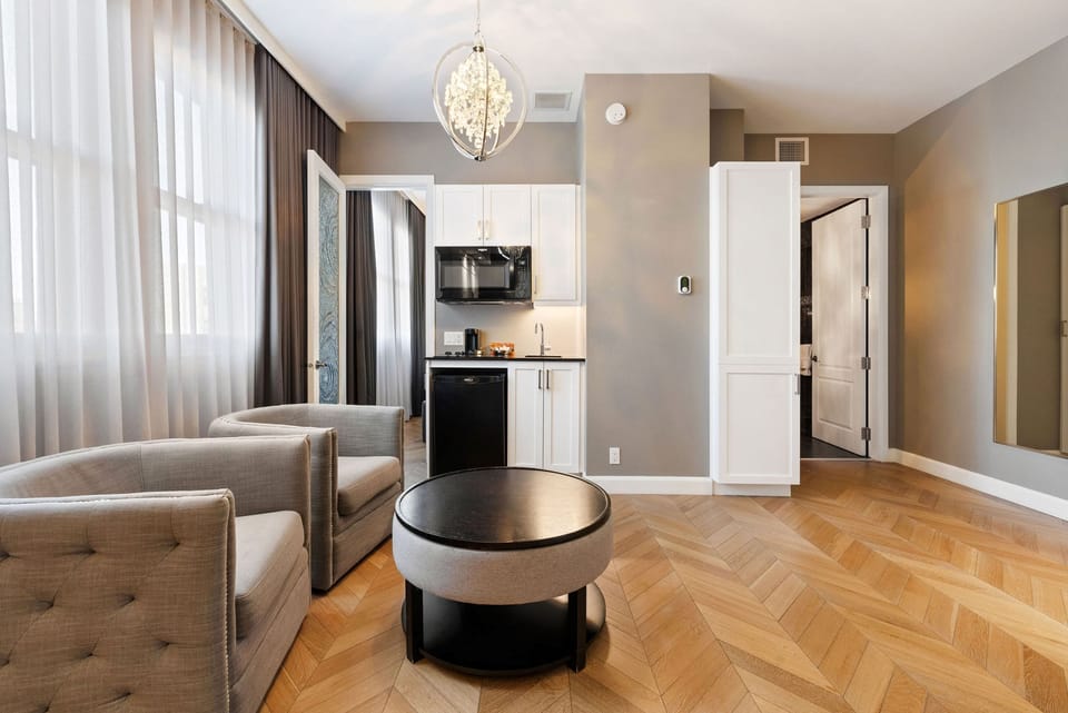 Junior Suite (building B - no pet allowed) | Living area | Flat-screen TV, heated floors