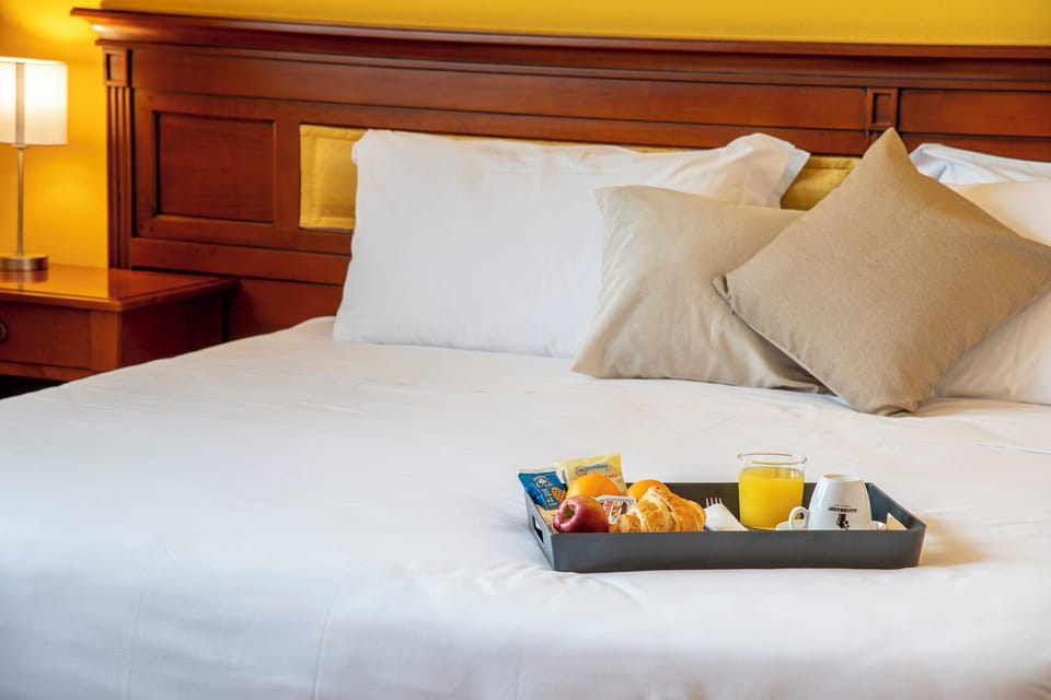 Frette Italian sheets, Select Comfort beds, minibar, in-room safe