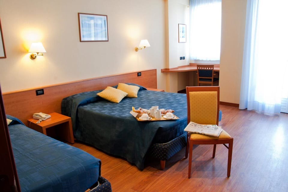 Triple Room | Down comforters, minibar, desk, soundproofing