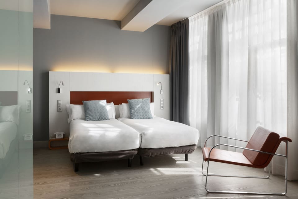 Superior Double Room | Minibar, in-room safe, desk, blackout drapes