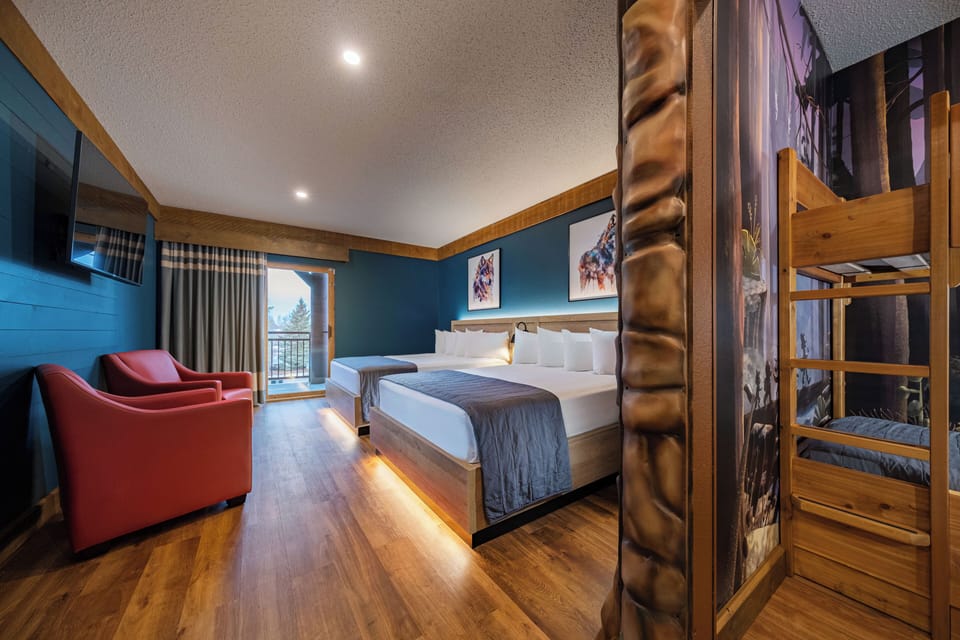 Deluxe Wolf Den Suite | Hypo-allergenic bedding, in-room safe, individually furnished