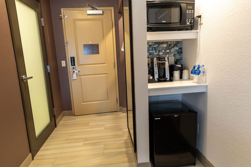 Room, 1 King Bed (With Drinks-Snacks) | Minibar, laptop workspace, iron/ironing board, free WiFi