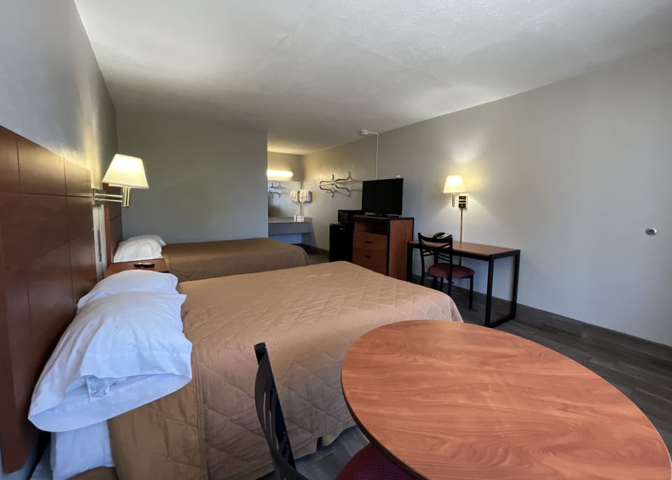 Deluxe Room, 2 Double Beds, Non Smoking | Desk, laptop workspace, blackout drapes, iron/ironing board