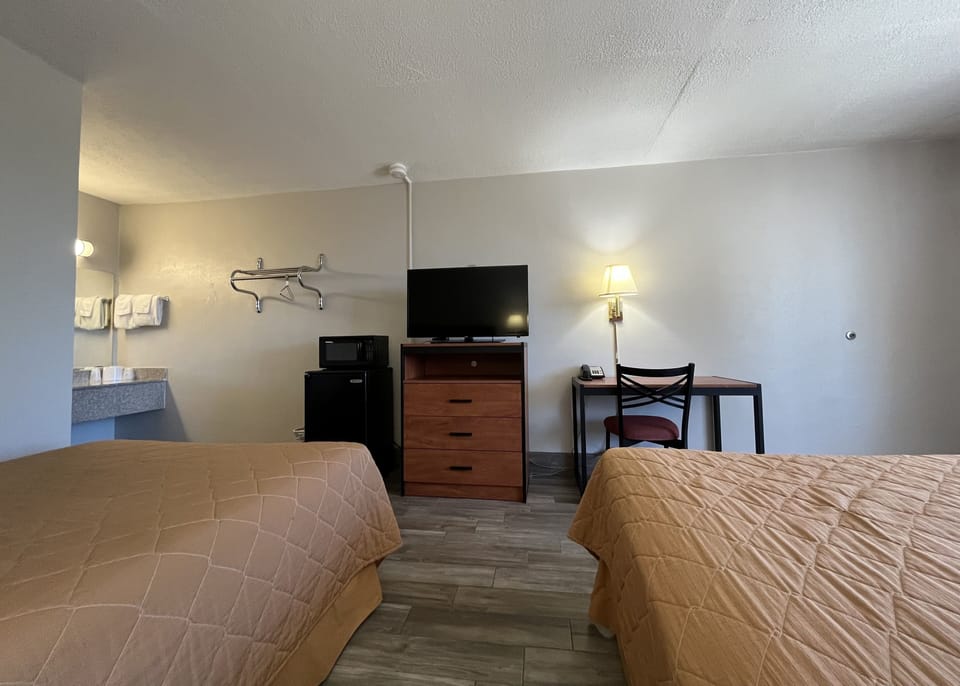 Deluxe Room, 2 Double Beds, Non Smoking | Desk, laptop workspace, blackout drapes, iron/ironing board