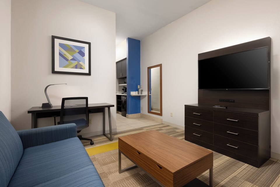 Suite, 1 King Bed | In-room safe, desk, soundproofing, iron/ironing board
