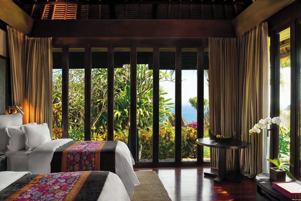 Premium bedding, down comforters, free minibar items, in-room safe