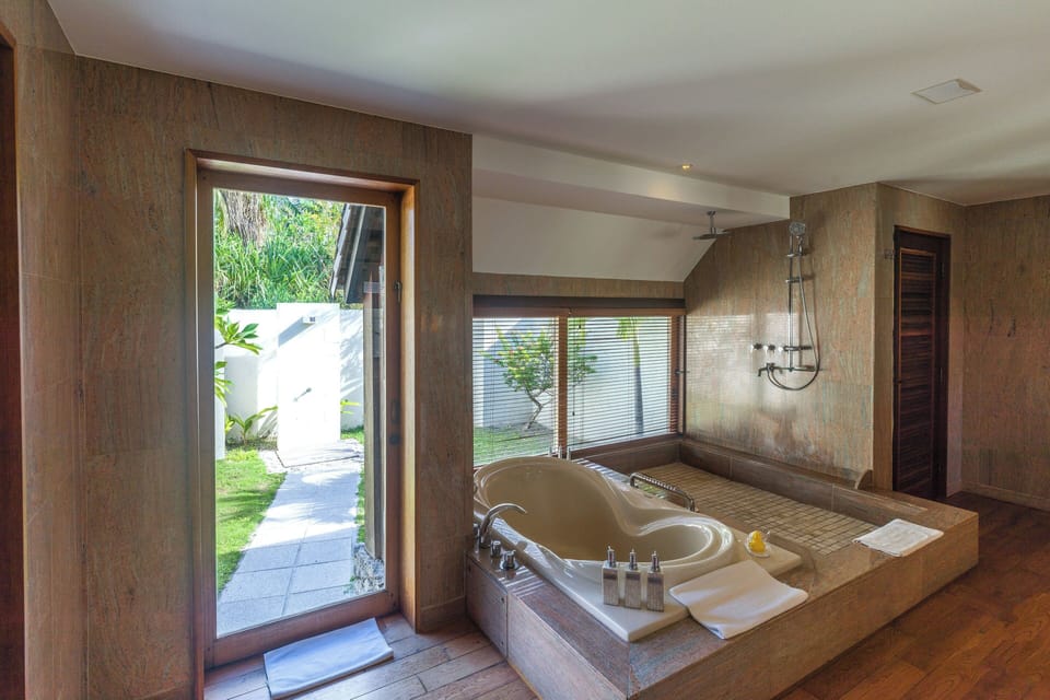 Royal Villa, 2 Bedrooms, Ocean View | Bathroom | Separate tub and shower, deep soaking tub, rainfall showerhead