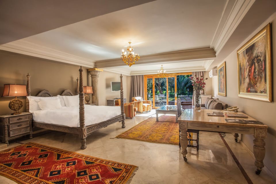 Executive Suite | 1 bedroom, minibar, in-room safe, individually decorated