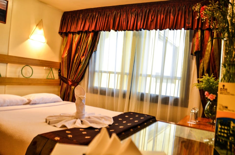Standard Room, City View | Pillowtop beds, minibar, individually decorated, individually furnished