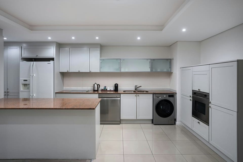 Apartment, 1 Bedroom | Private kitchen | Coffee/tea maker, full-size fridge, microwave, oven